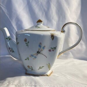 Elegant White Teapot with Gold Accents